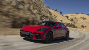 Porsche sets half-year sales record in...